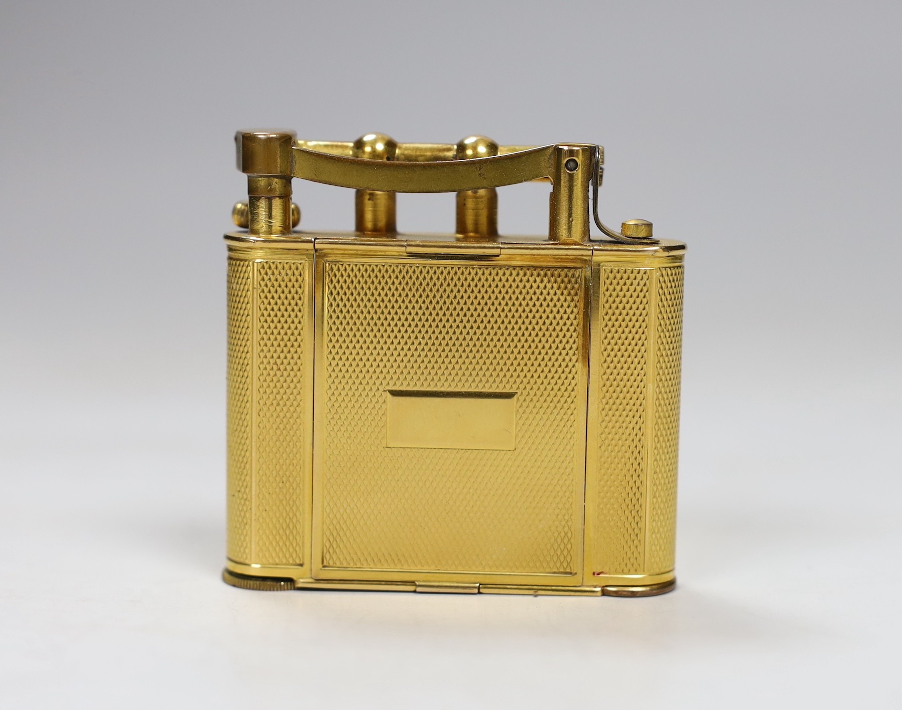 A gilt Dunhill compact / lipstick / cigarette lighter, 6cm with original box